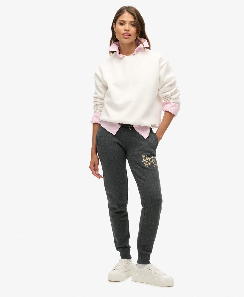 luxe slim joggers met metallic logo in bijna zwart gemêleerd.
