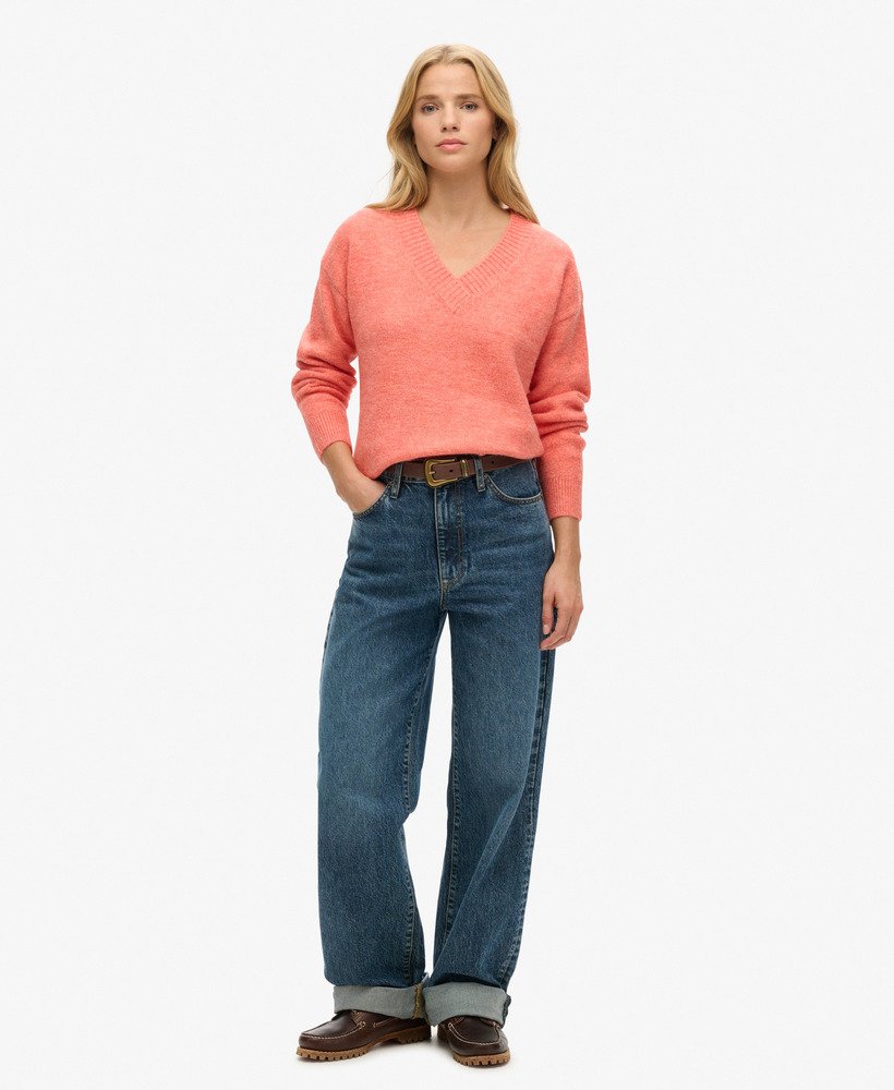 oversized v-hals trui in appeloranje gemêleerde kleur.
