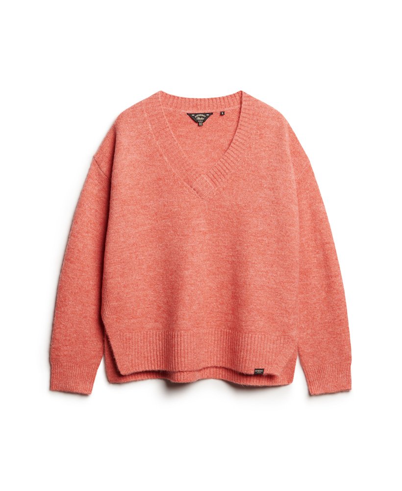 oversized v-hals trui in appeloranje gemêleerde kleur.