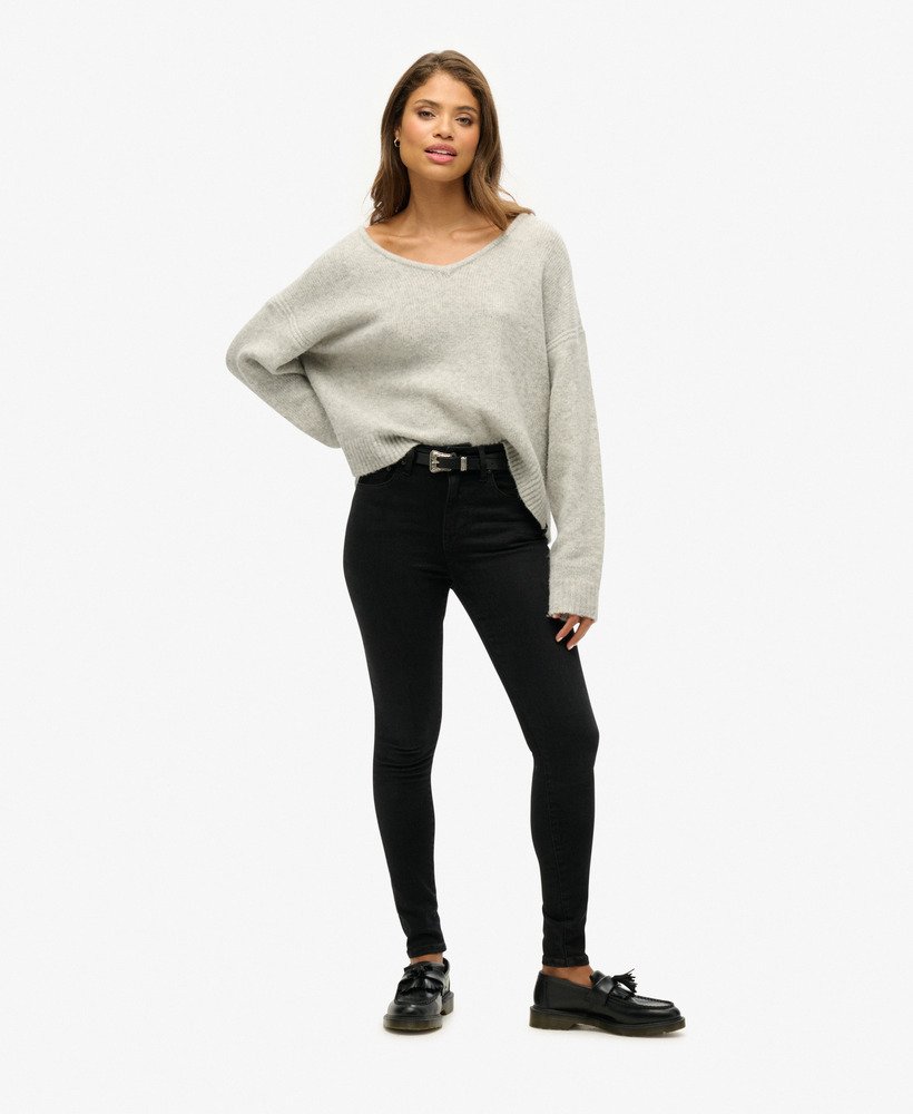 oversized v-hals trui in lichtgrijs met twist.