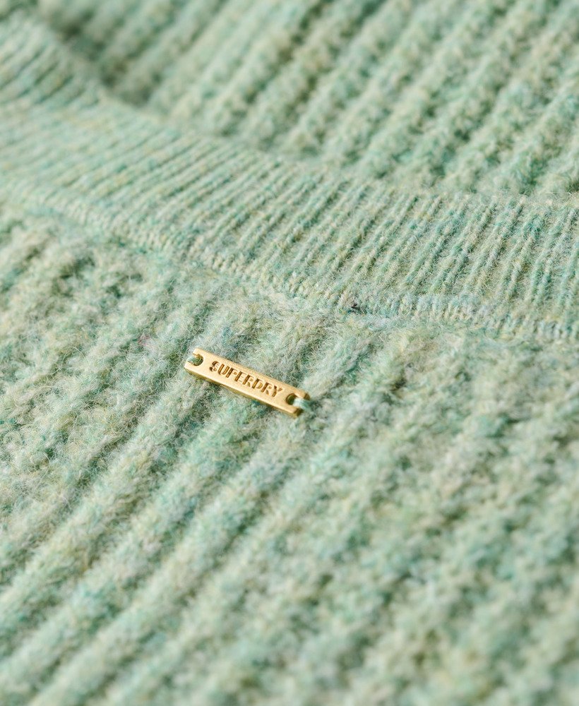 trui met ronde hals en geborstelde afwerking in zachtgroene kleur.