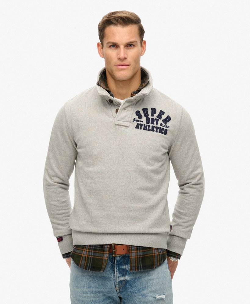vintage sportieve halfknoops sweater in lichtgrijs gemêleerd.