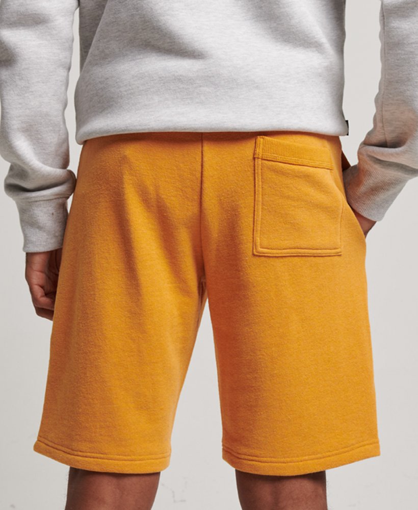 vintage jersey shorts met geborduurd logo in een goudkleurige gemêleerde stof.