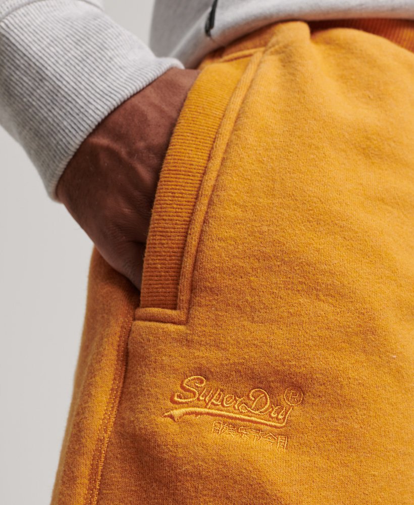 vintage jersey shorts met geborduurd logo in een goudkleurige gemêleerde stof.