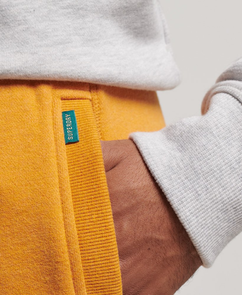 vintage jersey shorts met geborduurd logo in een goudkleurige gemêleerde stof.
