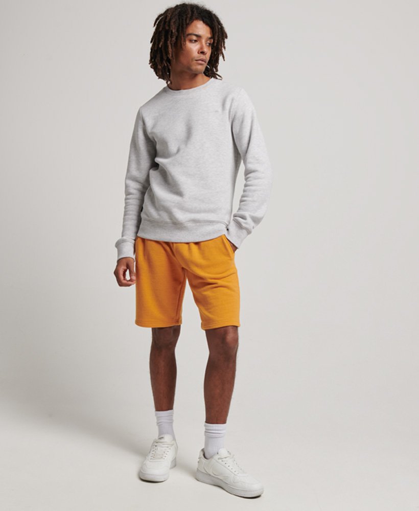 vintage jersey shorts met geborduurd logo in een goudkleurige gemêleerde stof.