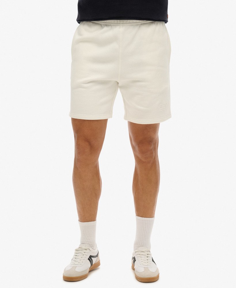 sportswear shorts met reliëfprint en losse pasvorm in nieuw krijtwit.