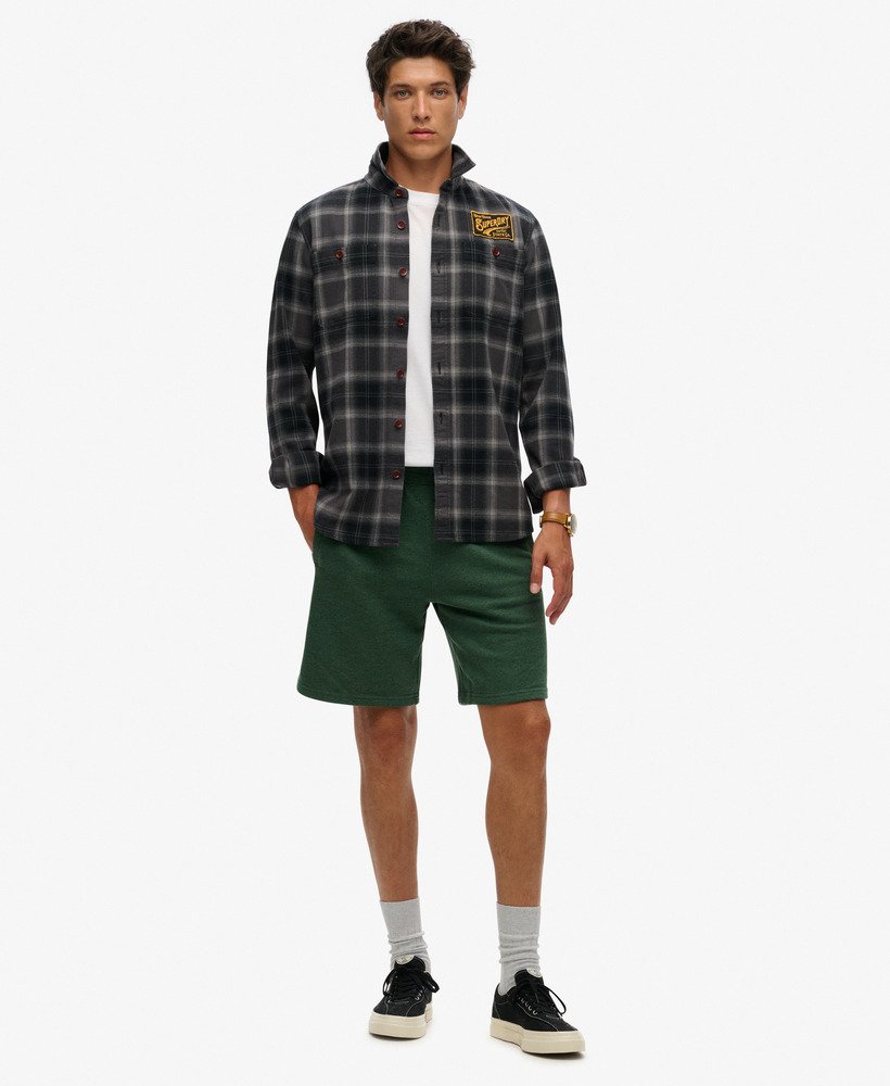 essential logo jersey shorts in heritage pine green marl