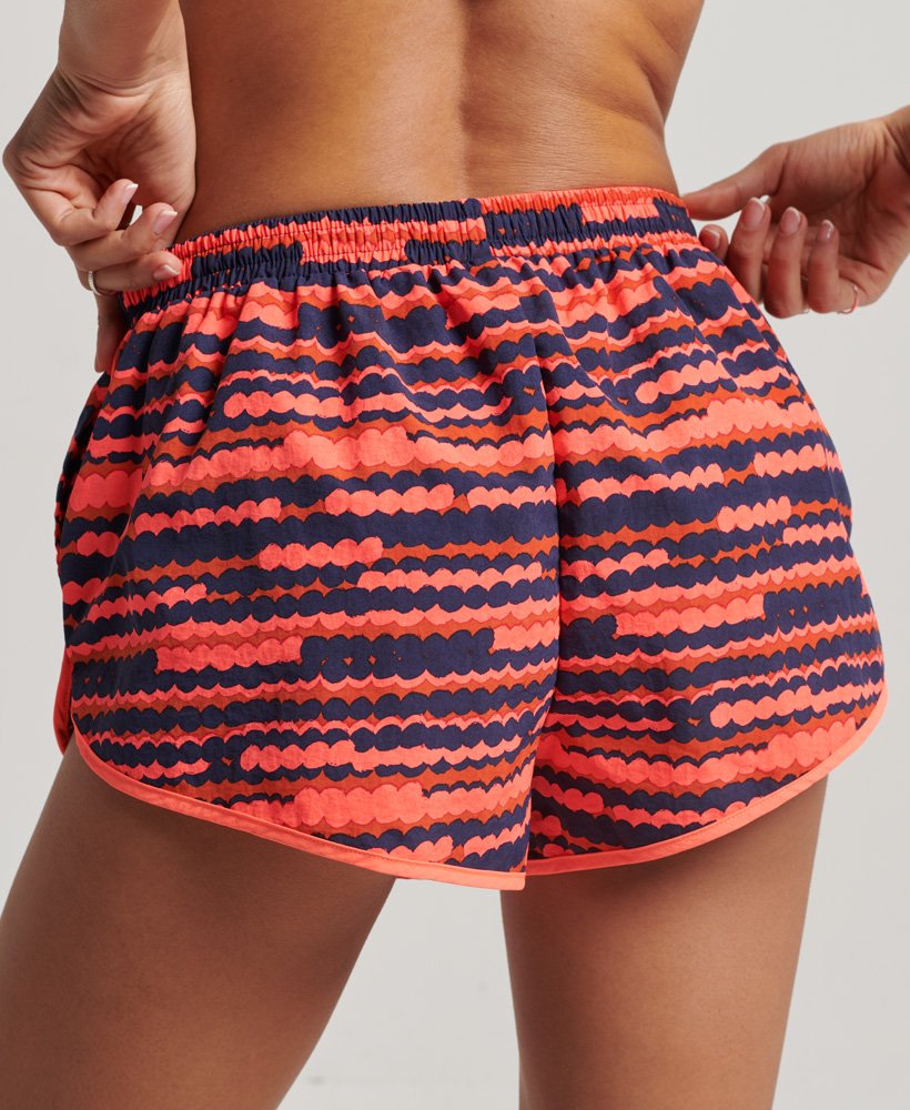 bedrukte strandshorts in fluorroze