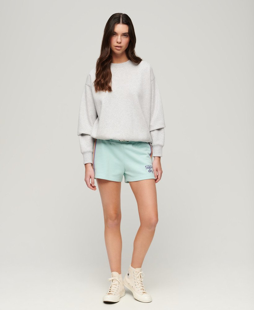 shorts met regenboogkleurige zijstreep en logo in grijsgroen.