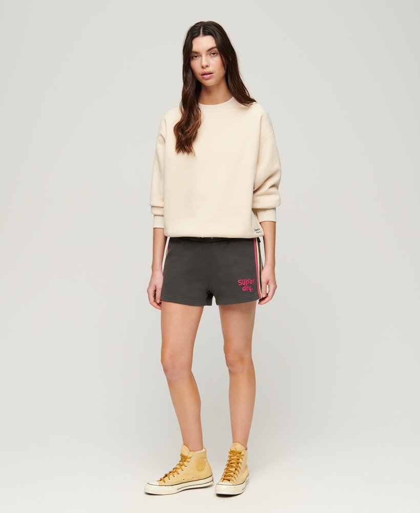 shorts met regenboogkleurige zijstreep en logo in gewassen zwart.
