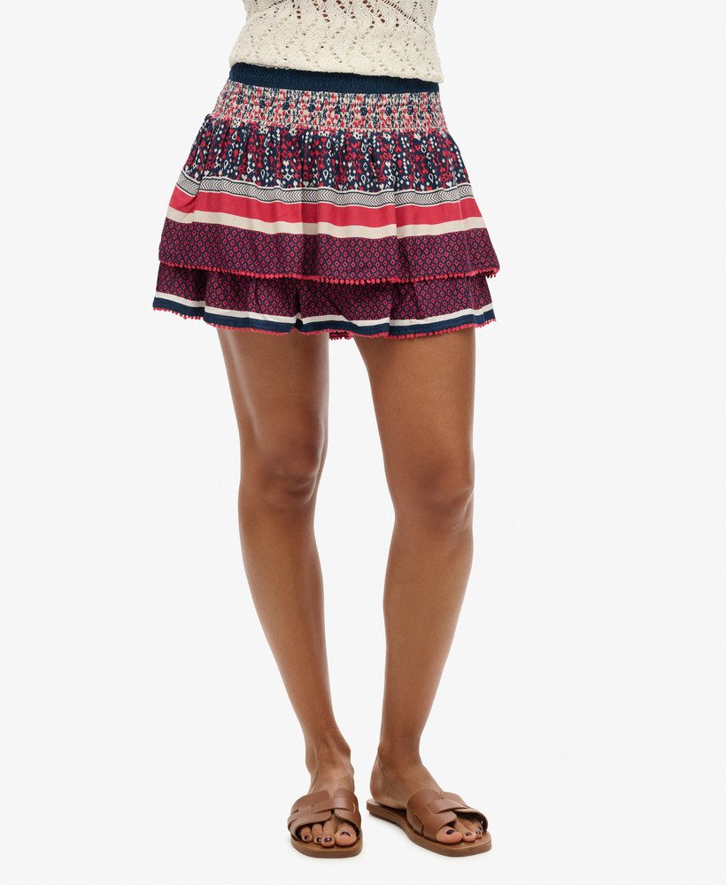 vintage gelaagde minirok met lineaire ikat-randprint