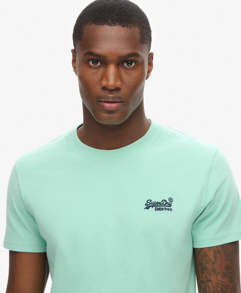 t-shirt met essential-logo van biologisch katoen in spearmint lichtgroen.