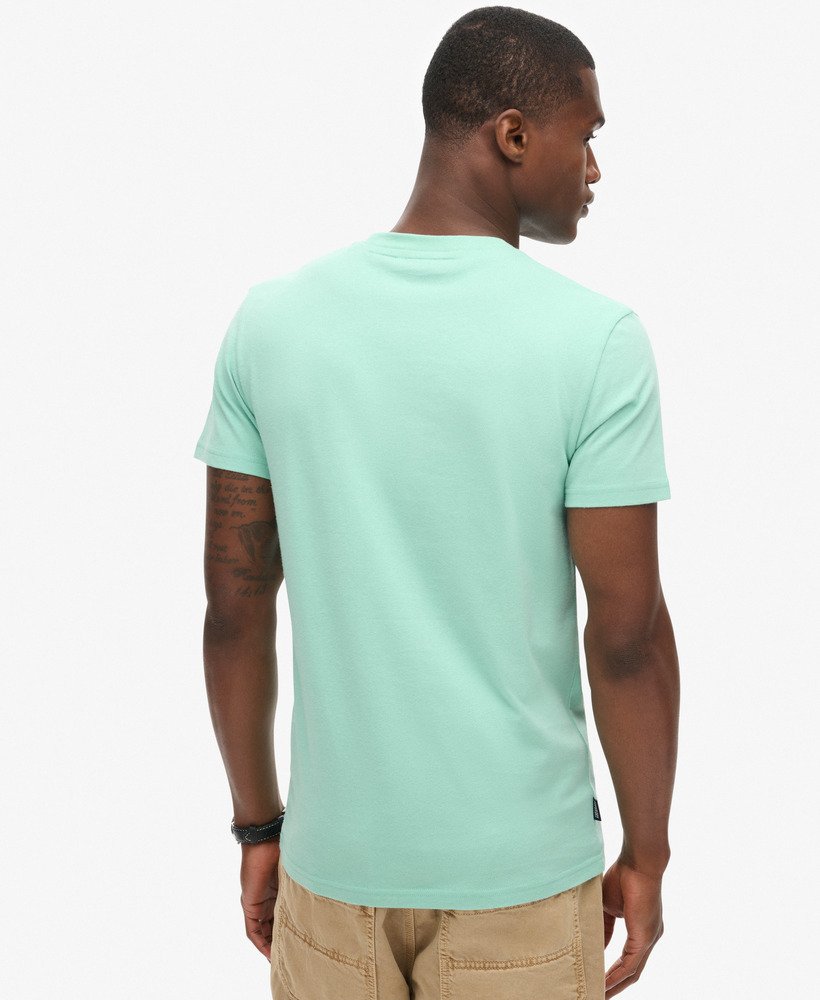 t-shirt met essential-logo van biologisch katoen in spearmint lichtgroen.