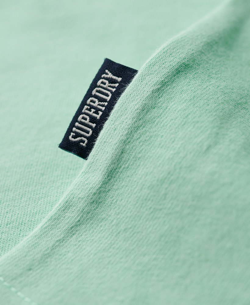 t-shirt met essential-logo van biologisch katoen in spearmint lichtgroen.
