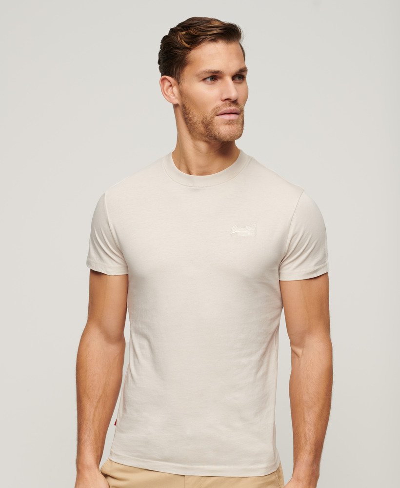 t-shirt van biologisch katoen met geborduurd essential-logo in wit zand.