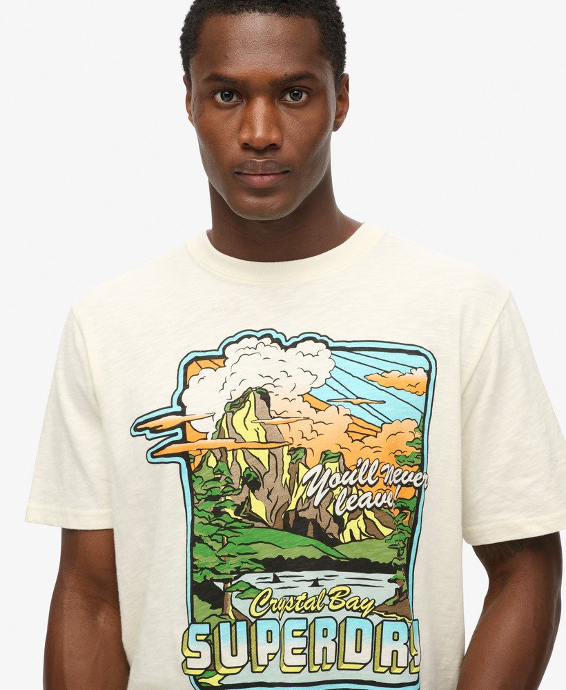 neonkleurig t-shirt met reisprint en losse pasvorm in gebroken wit met structuurverf.