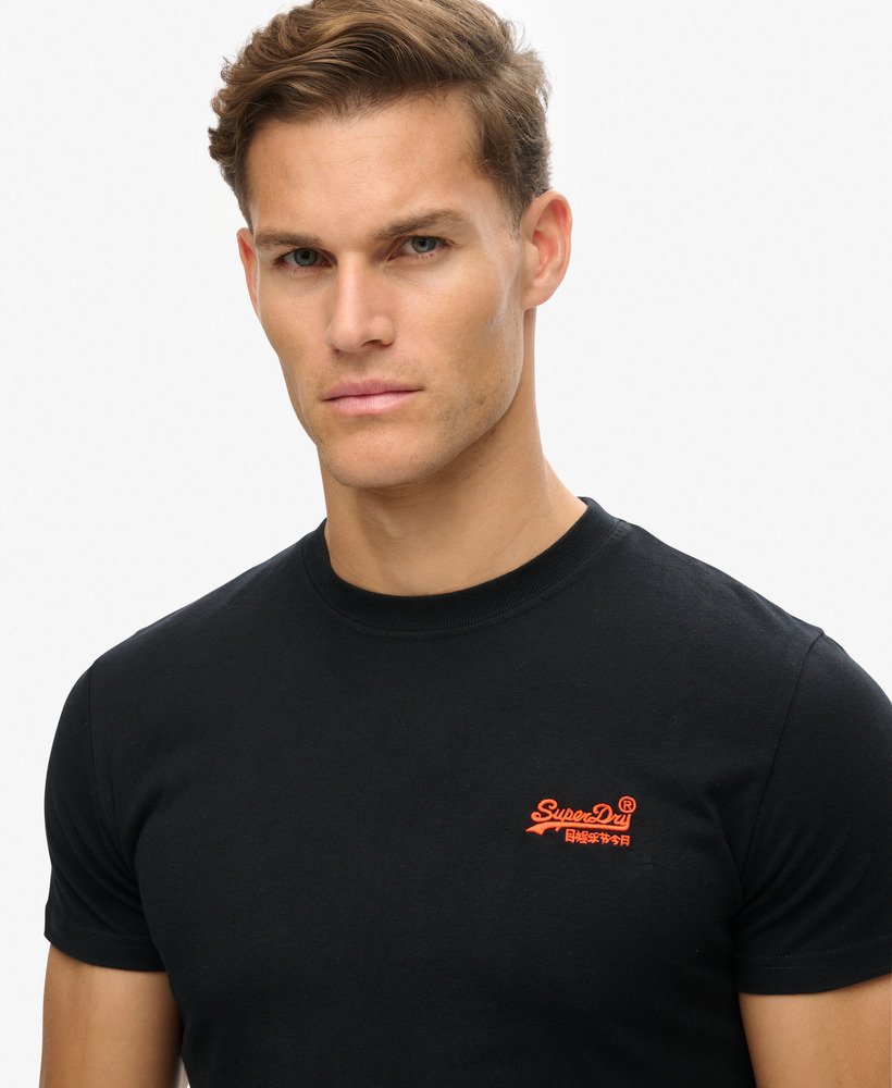 t-shirt met essential-logo van biologisch katoen in zwartalarmerend oranje.