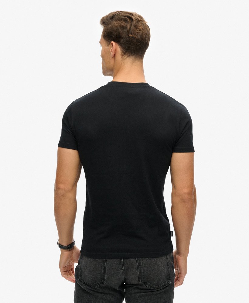 t-shirt met essential-logo van biologisch katoen in zwartalarmerend oranje.
