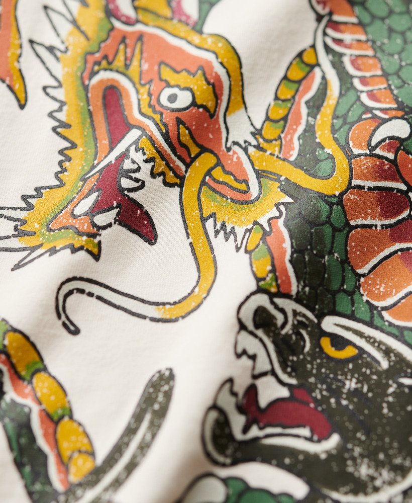 oversized t-shirt met tattoo-print in crèmekleur.