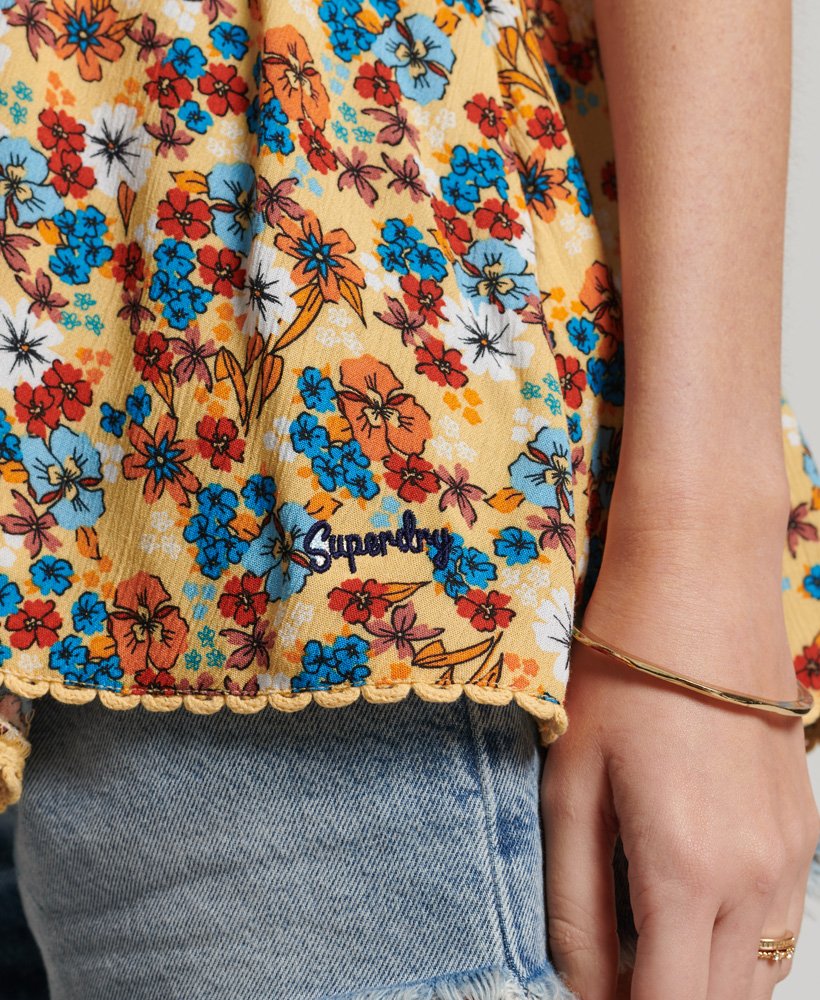 halter strandtopje in jaren 70 gele bloemenprint