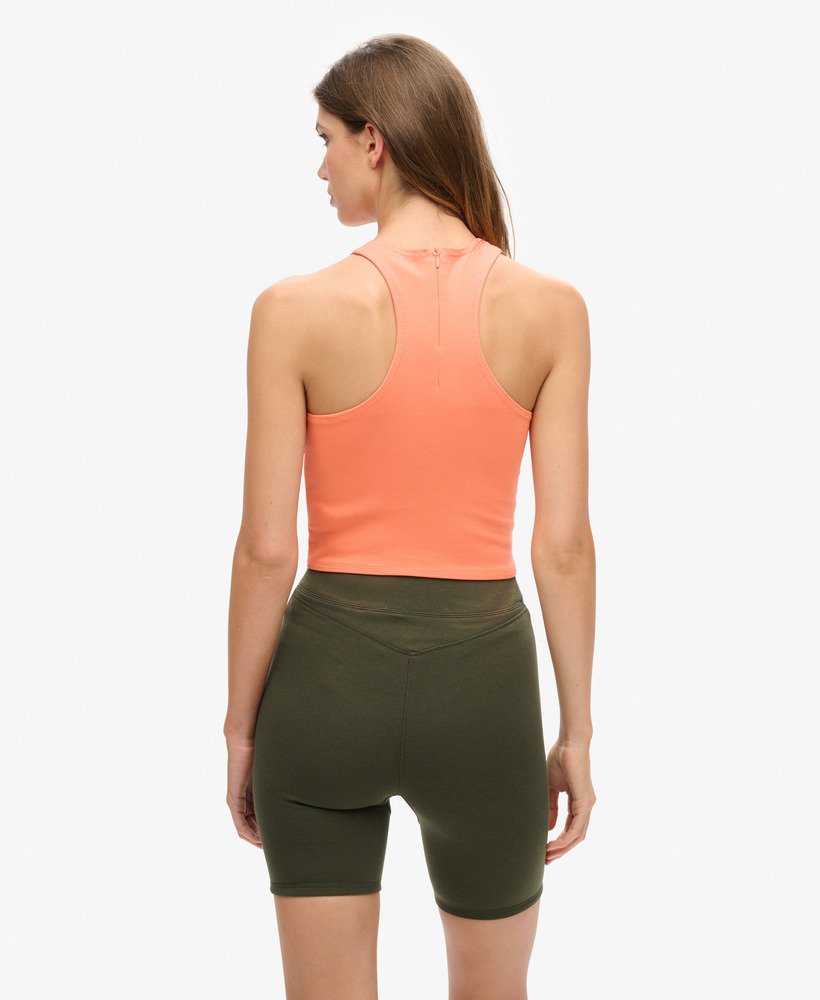 code tech racer vest top in pastelline coral