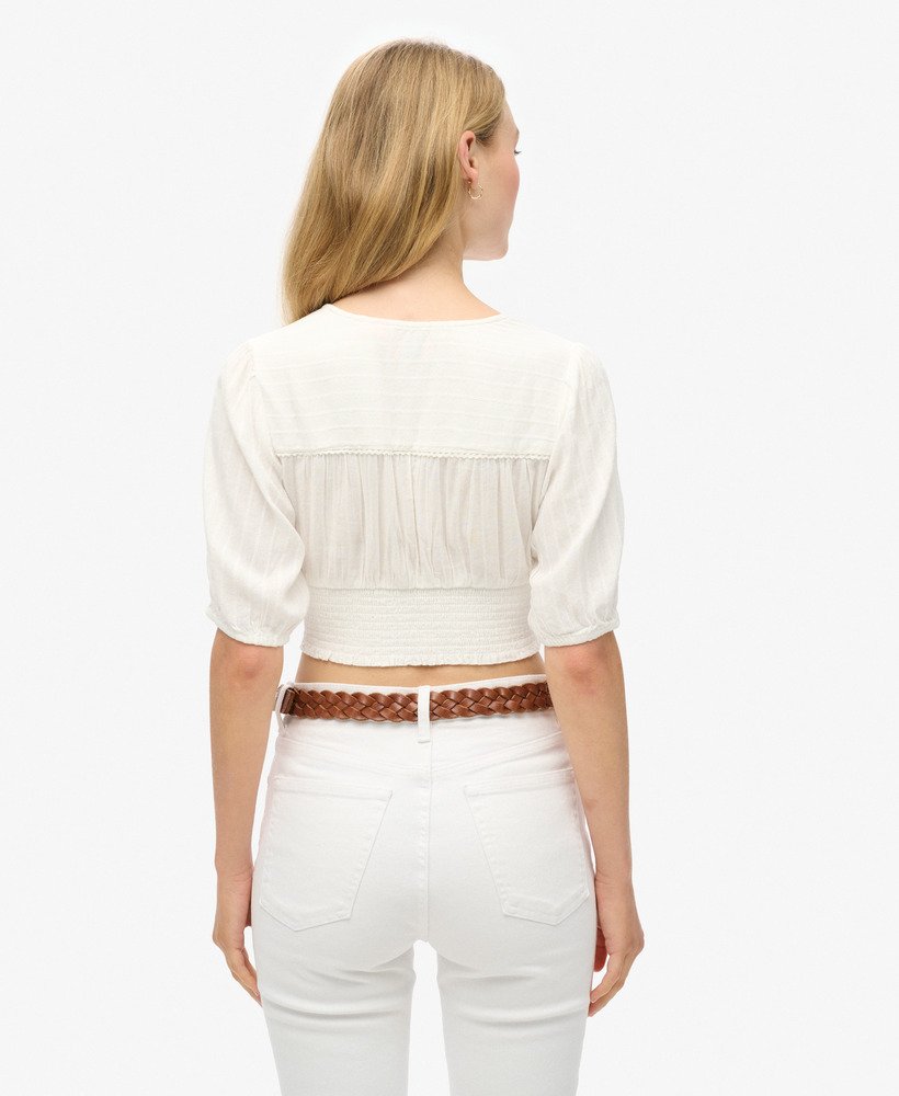 ibiza top met korte mouwen en kanten afwerking in gebroken wit