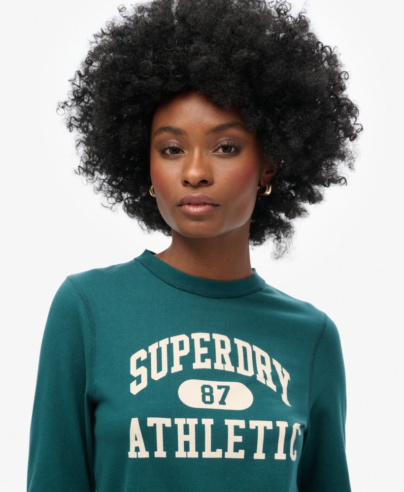 athletic essentials ringer slim top met lange mouwen in donker dennengroen