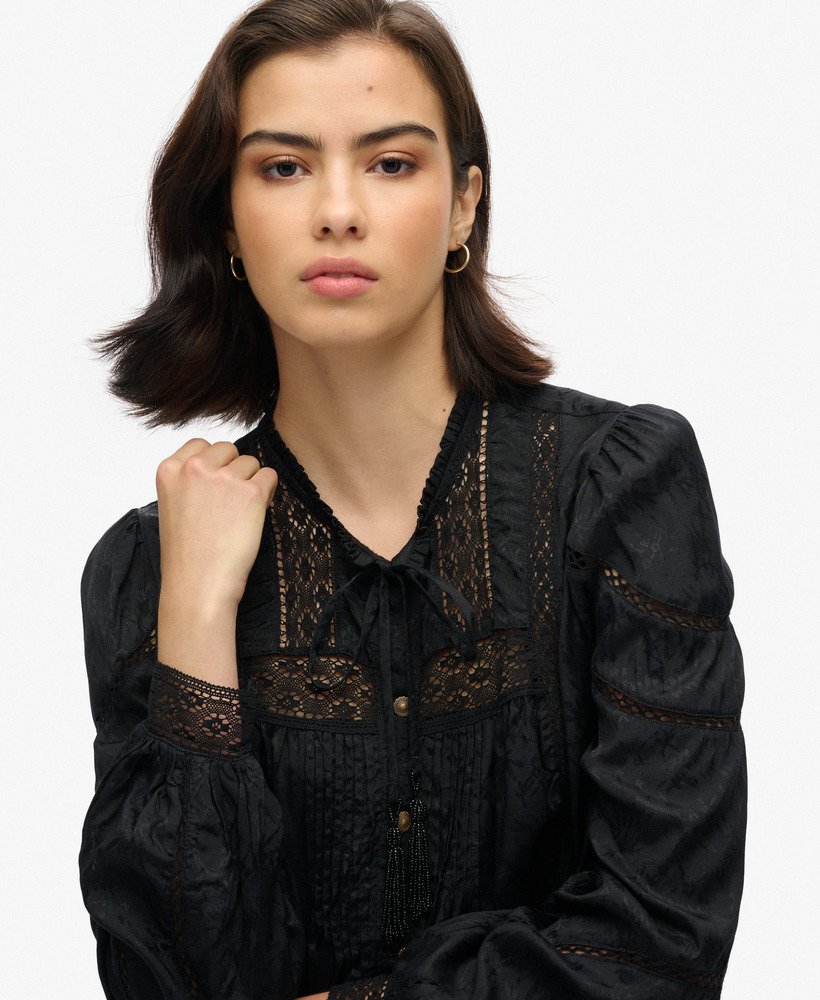 blouse met lange mouwen van geweven kant in zwart