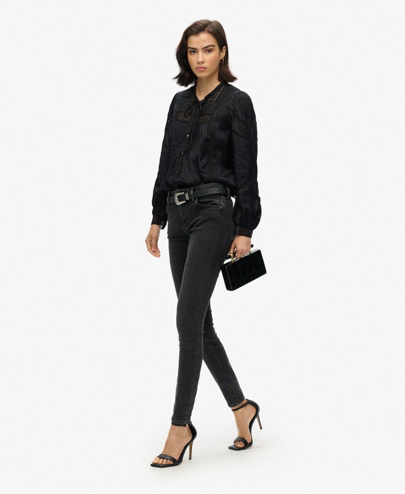 blouse met lange mouwen van geweven kant in zwart