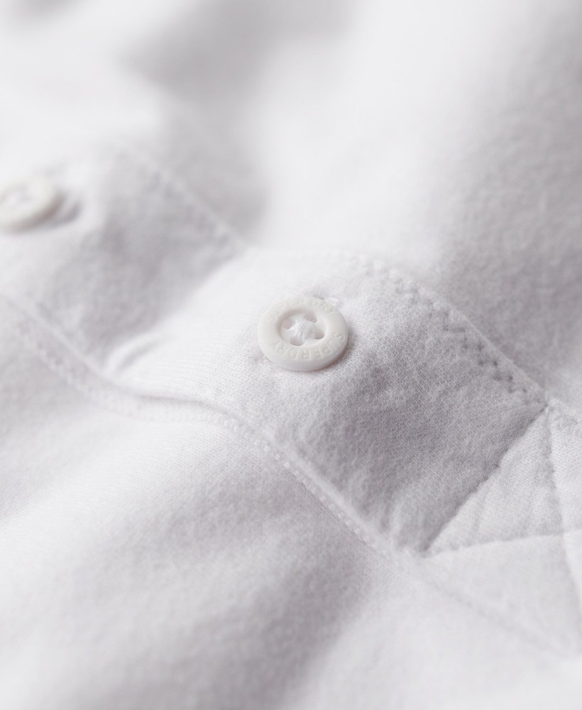 vintage top met geborduurd logo en halve knoopsluiting in optic