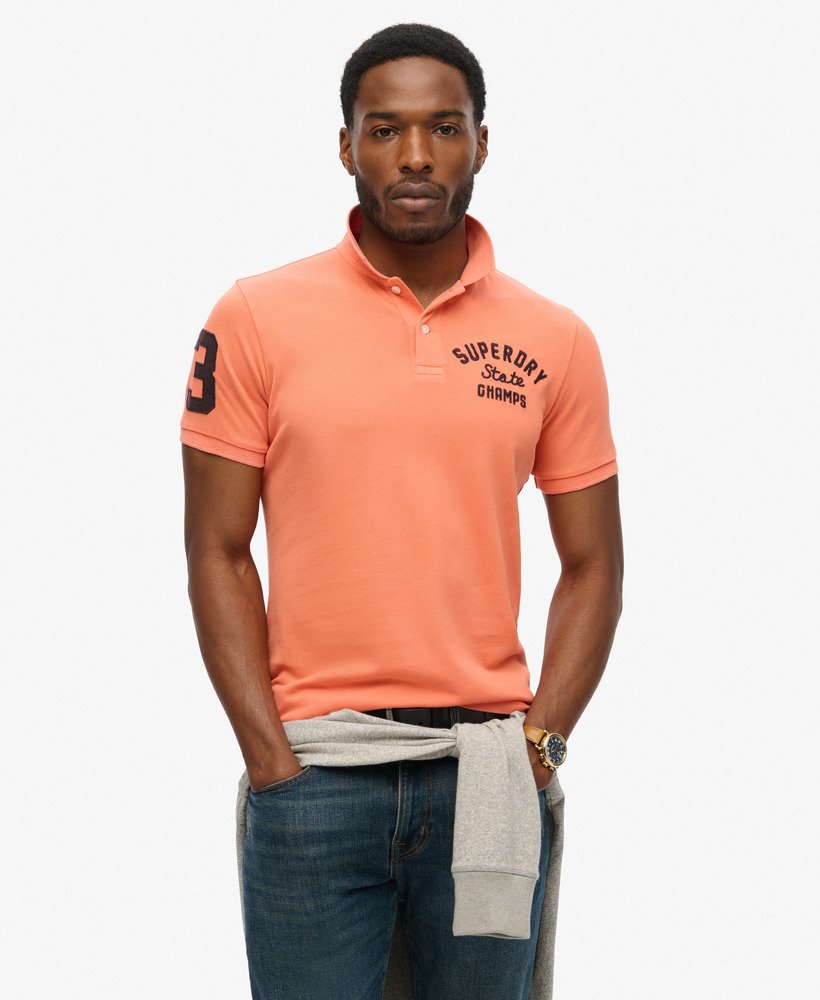 superstate poloshirt in sunburst coral