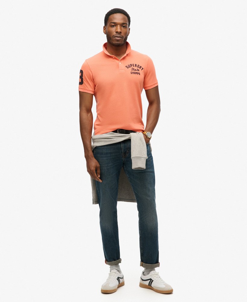 superstate poloshirt in sunburst coral
