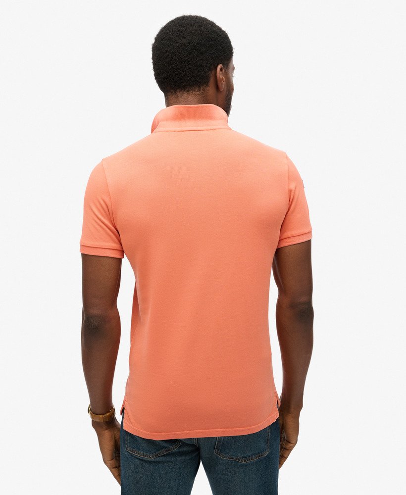 superstate poloshirt in sunburst coral