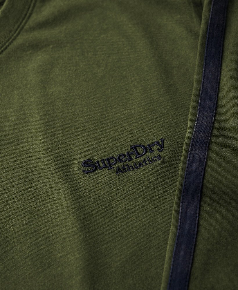 essential logo retro top met lange mouwen in sporttasgroen