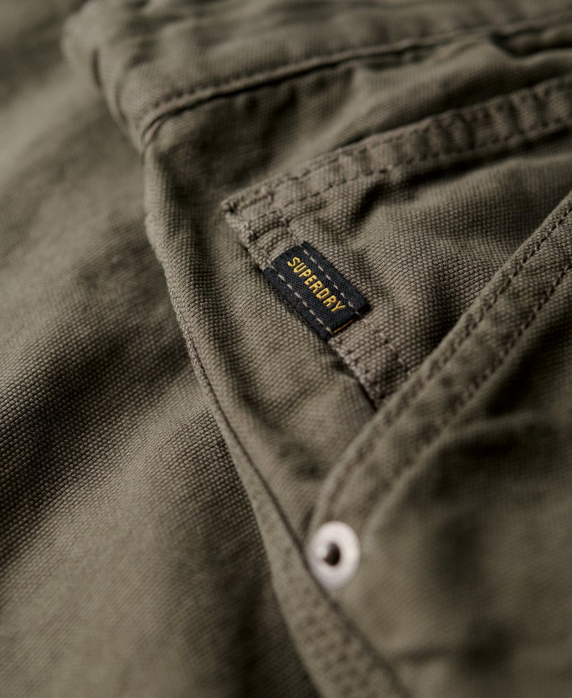 vintage timmermansbroek in dof bruin.